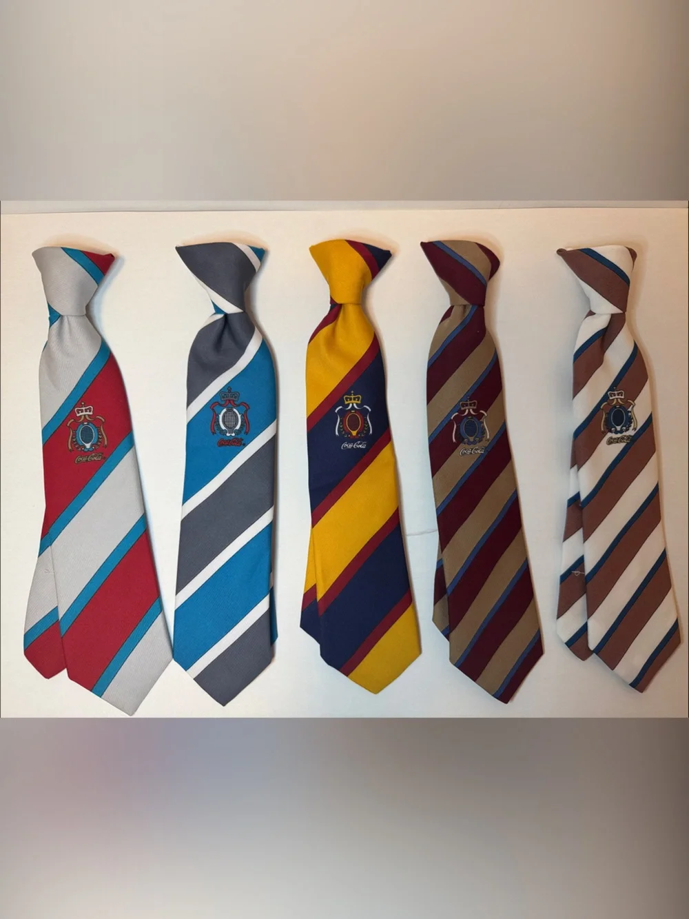 Coca Cola Striped Crest Ties in Red, Blue, Yellow, Gray and Brown